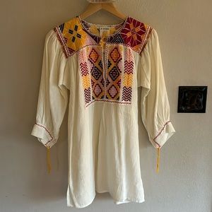 Fun, embroidered top. Beautiful detail